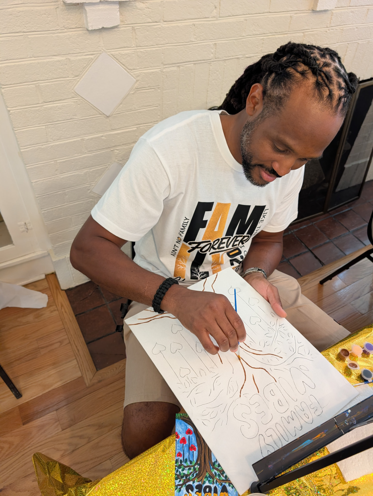 A Chandler cousin sketching the trunk of his Family Vibes tree