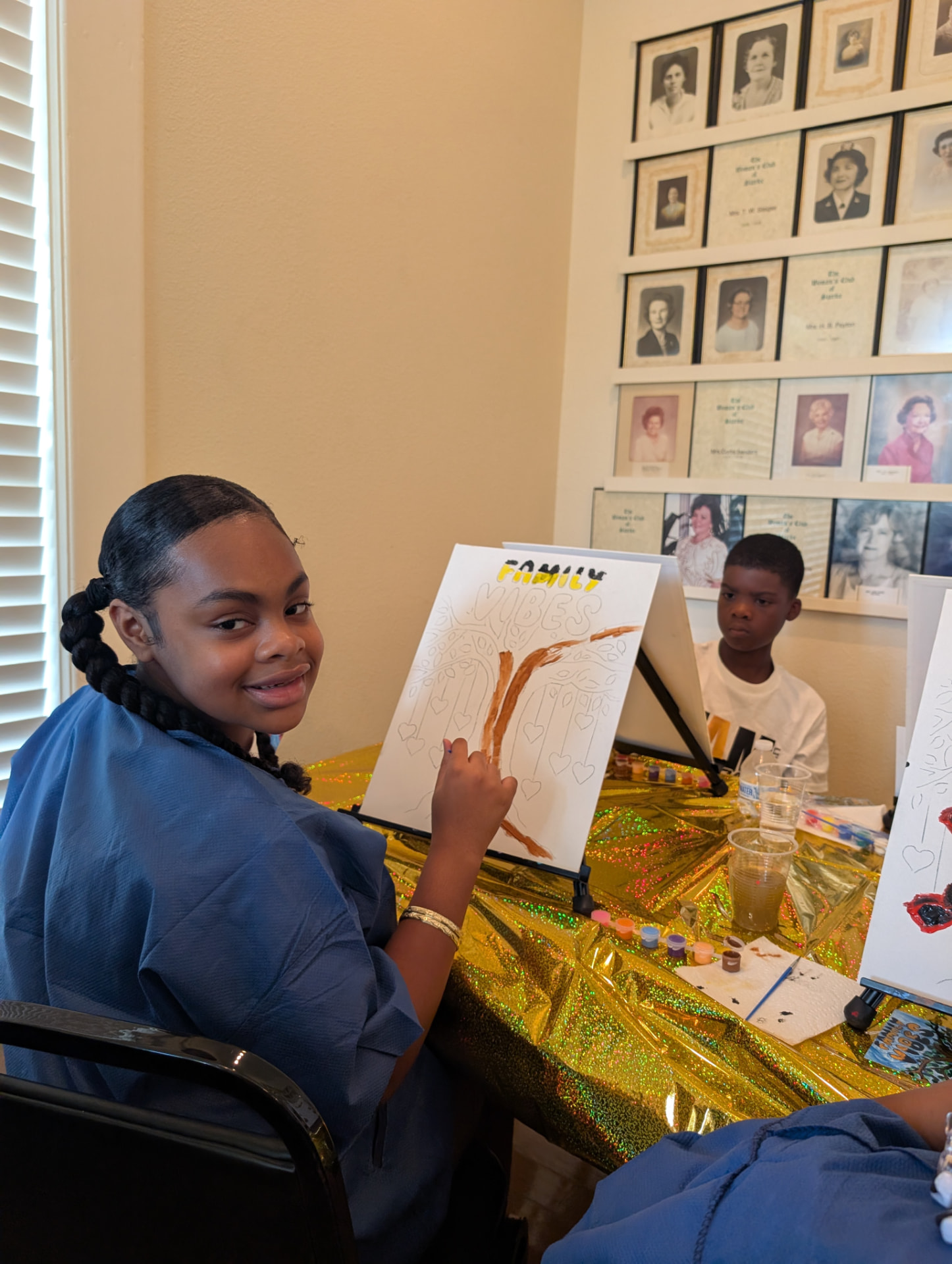 Young painters starting their Family Vibes canvases at the paint party