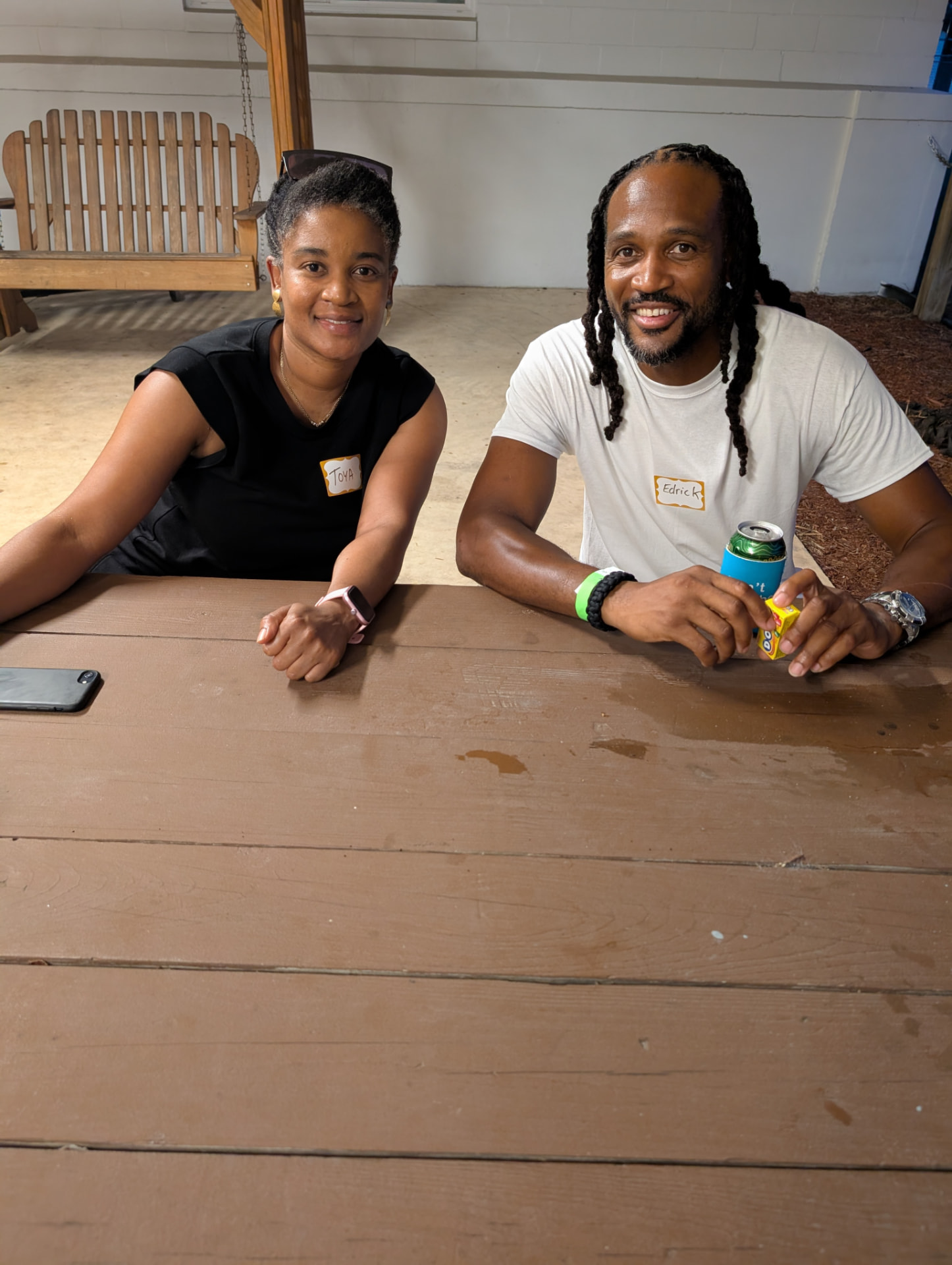 Toya and Edrick catching up at the pavilion table